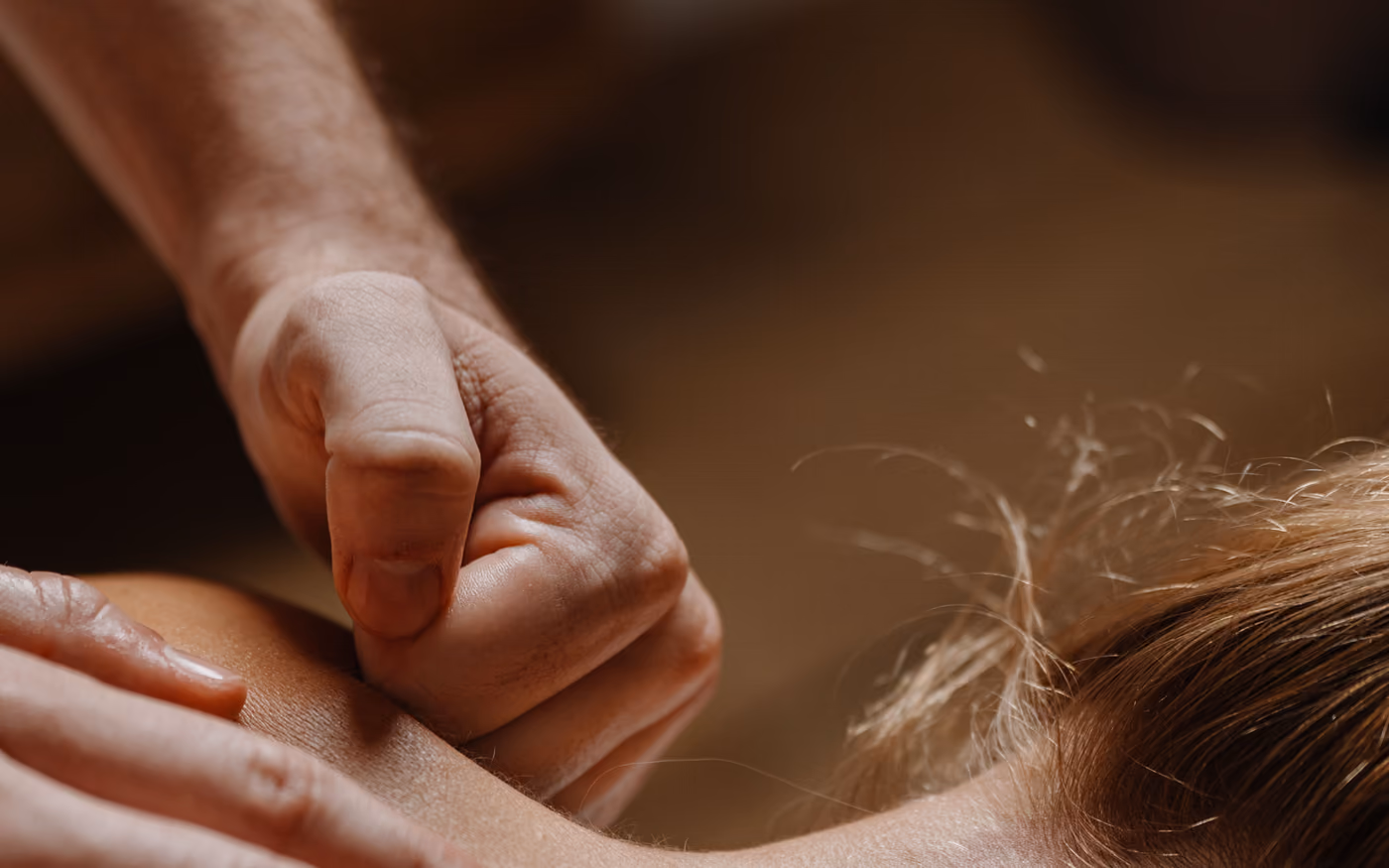 Calm hands on the shoulder blade